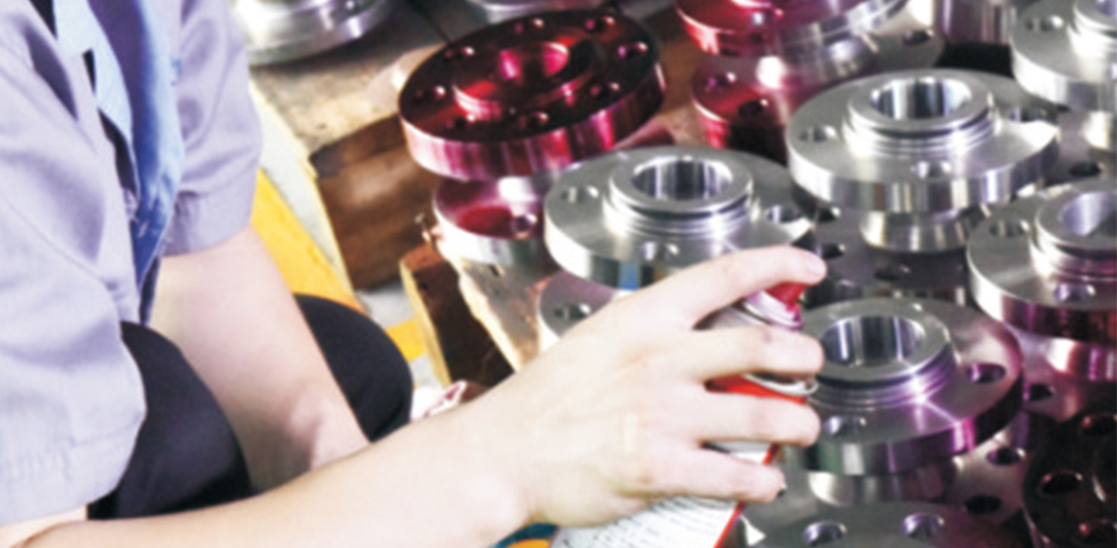 Dye penetrant testing and quality control in industrial valve manufacturing